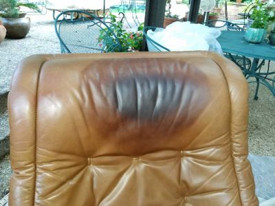 Skin Oils Contamination With Staining To Unfinished Leather Headrest Restored (before)